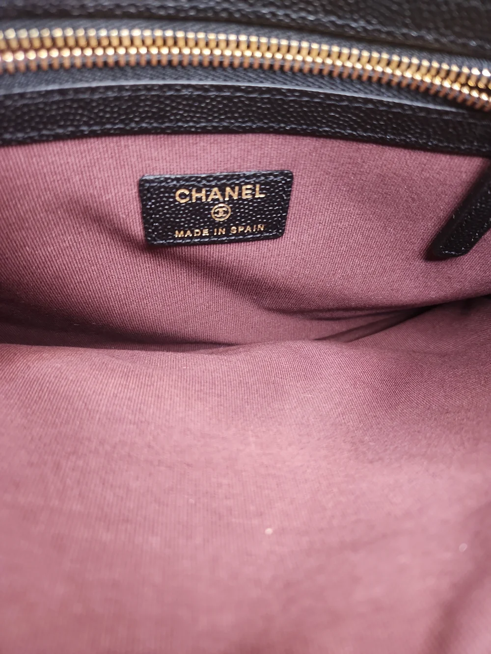 CHANEL Black Quilted Caviar Leather Pouch with Gold CC